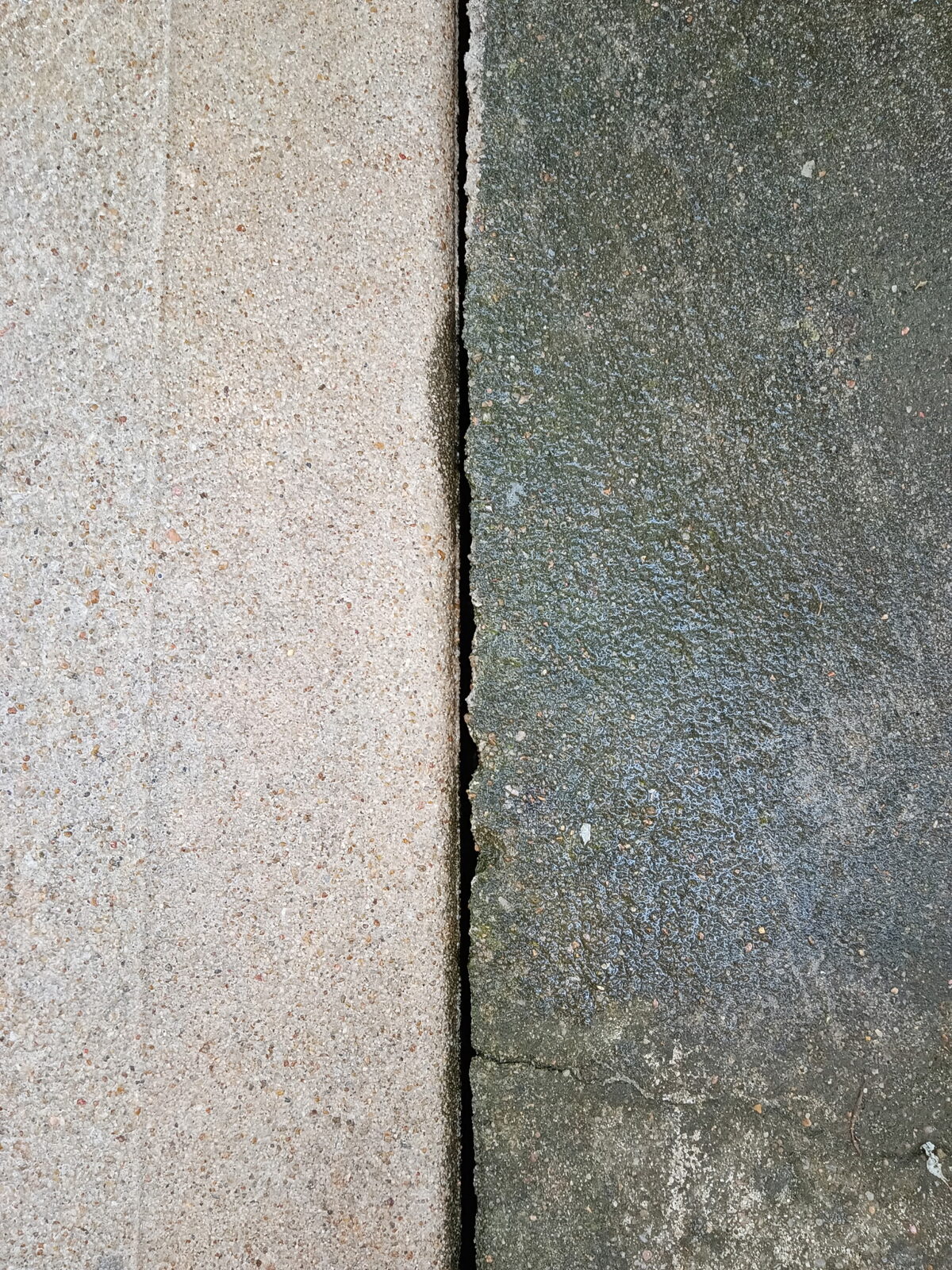 Close-up of concrete before and after cleaning