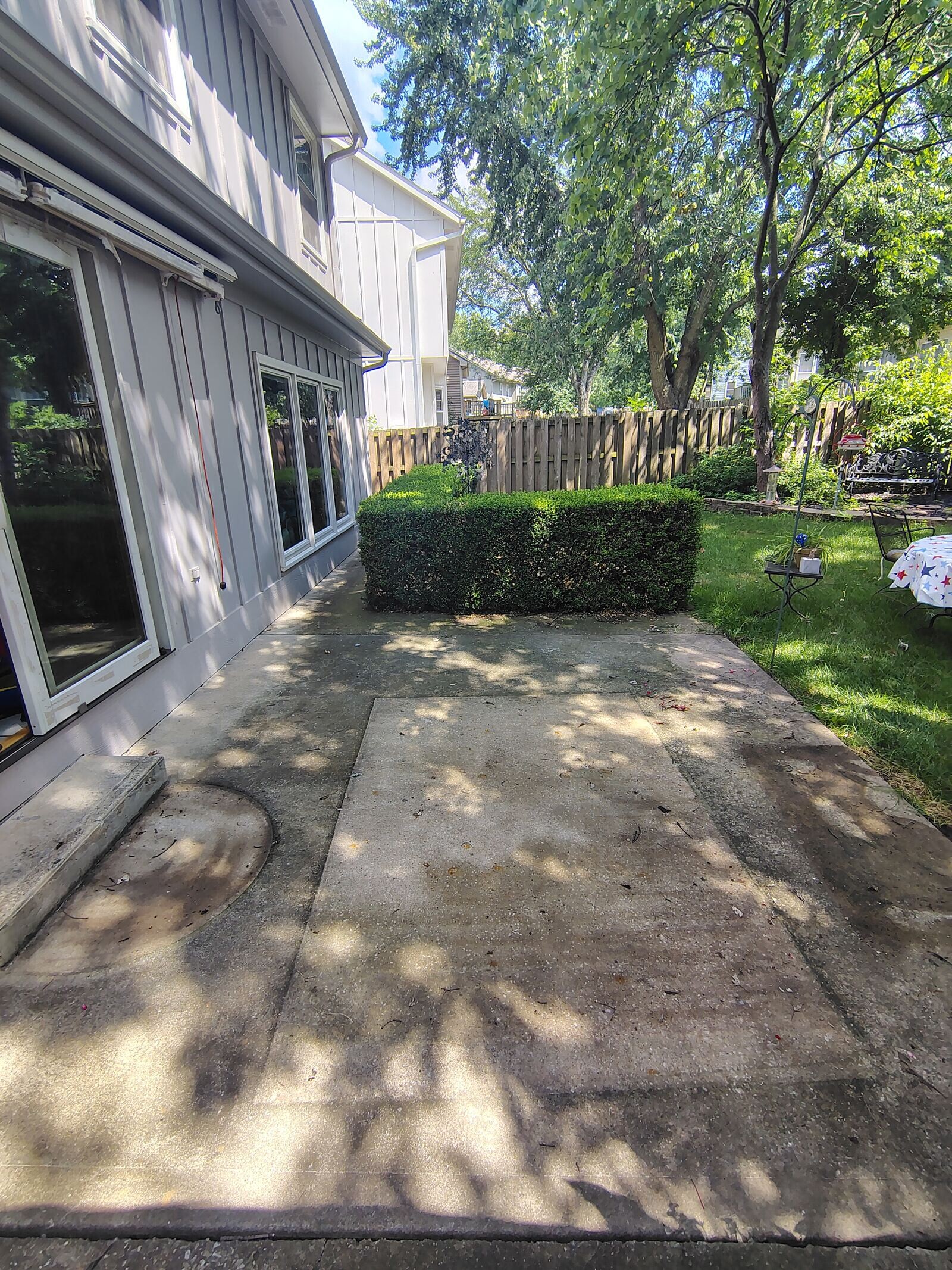 Patio before pressure washing